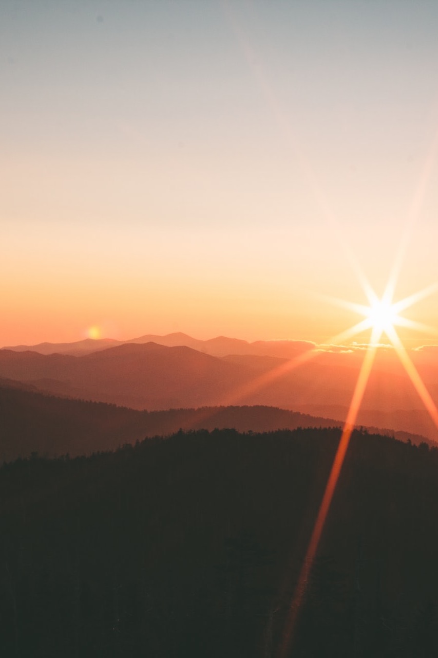 silhoutte of mountains during sunset